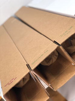 Unassembled sensory paths kits in cardboard boxes for children.